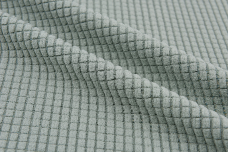 Picture of in stock pineapple plaid fleece sofa cover fabric wholesale waffle corn grain plaid jacquard flannel fabric