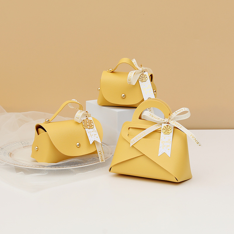 Picture of European Creative Wedding Candy Box Leather Ins Style Satchel Wedding Candy Bag Wedding Souvenir Gift Candy Gift Box