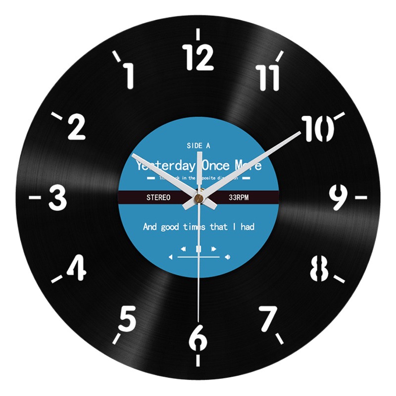 Step into the new reverse direction of the clock black rubber retro wall clock creative decorative watch reverse reverse walk personality wall clock