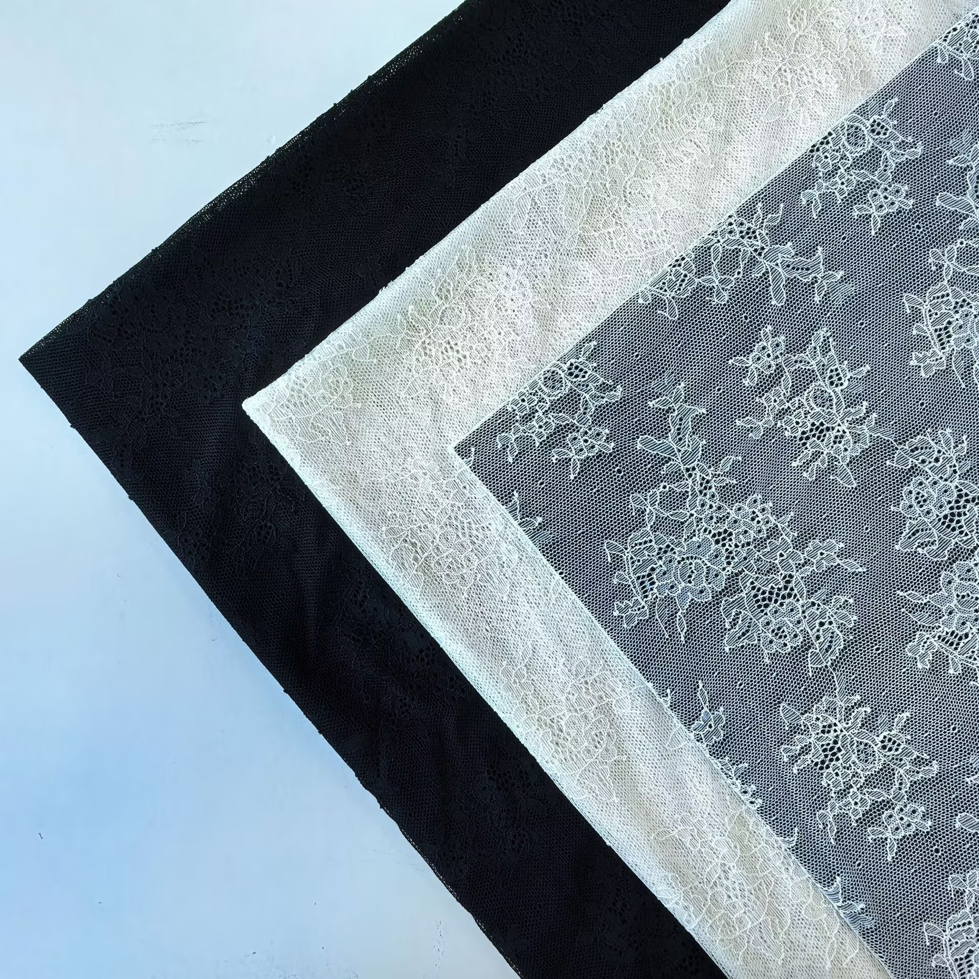 All-polyester non-elastic embroidered lace fabric, underwear, home textiles, dresses, wedding dresses, lace fabrics, in-stock wholesale