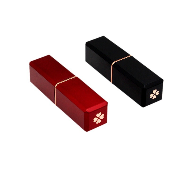 Picture of Factory in stock wholesale four-leaf clover black white lipstick tube empty tube 12.1 caliber printable logo lipstick tube