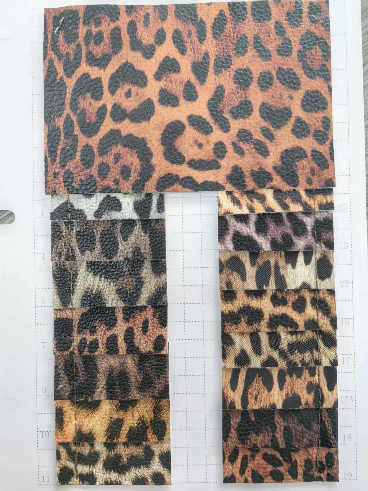 Picture of Guangzhou factory supply in stock wholesale leopard pu leather fabric mobile phone case packaging box luggage artificial leather