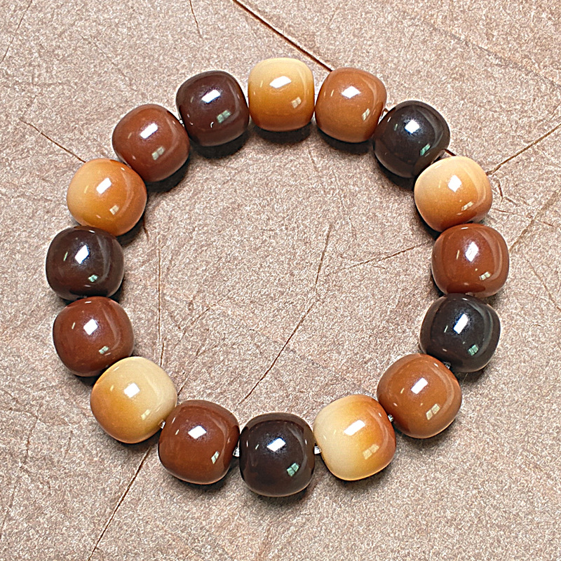 Picture of Factory wholesale sugar fried chestnut bodhi root hand string around the finger soft student version of the text play beads natural bodhi seed hand string