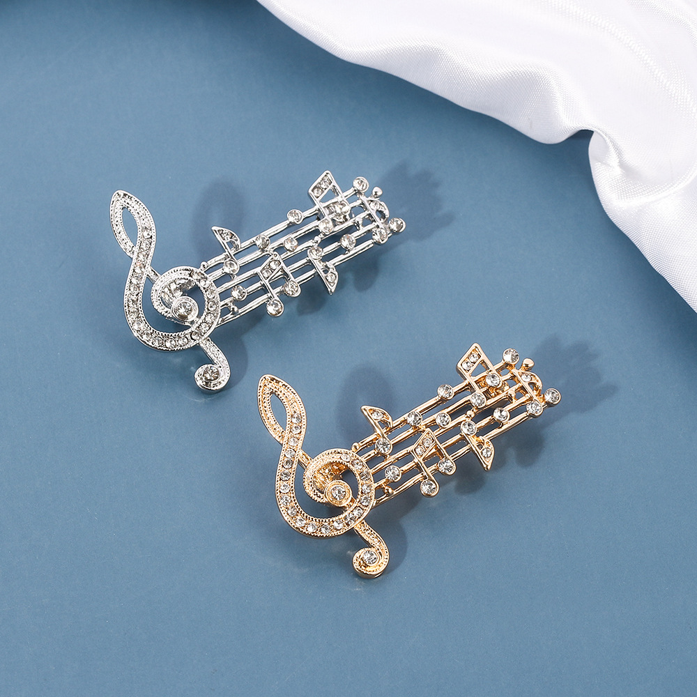 Picture of Elegant musical note music rhythm brooch inlaid with full diamond beating note pin bag clothes accessories spot