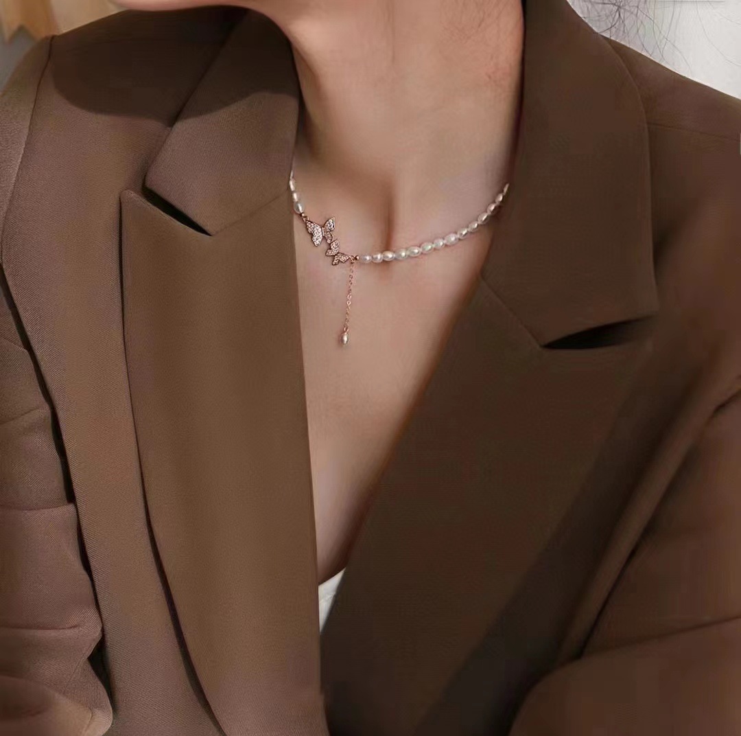 Picture of Zhuji freshwater pearl necklace necklace 5-6mm rice beads butterfly pendant 38 5cm length female clavicle chain wholesale