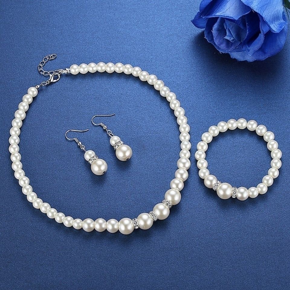 Picture of ABS pearl jewelry suit women's necklace earrings bracelet three-piece set gift for Mother beautiful wedding photo accessories