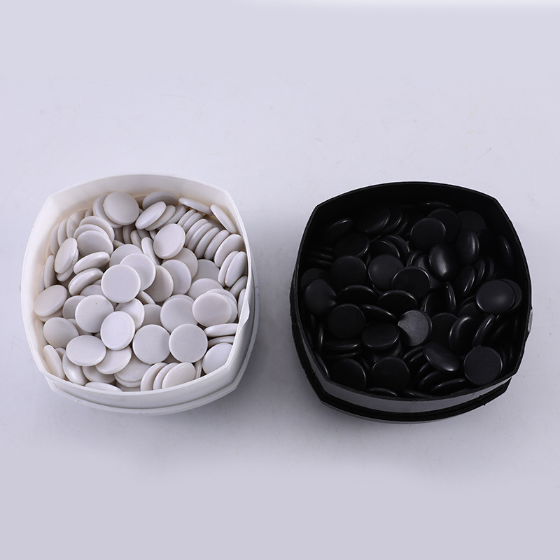 Picture of 1.9 small size WUKO chess bulk chess beginner entry chess black and white suit children