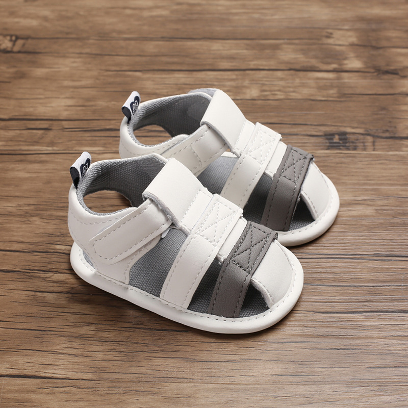 Baby Shoes summer 0-1 years old male and female baby ankle-wrapped hollow sandals non-slip soft bottom toddler shoes one-piece delivery