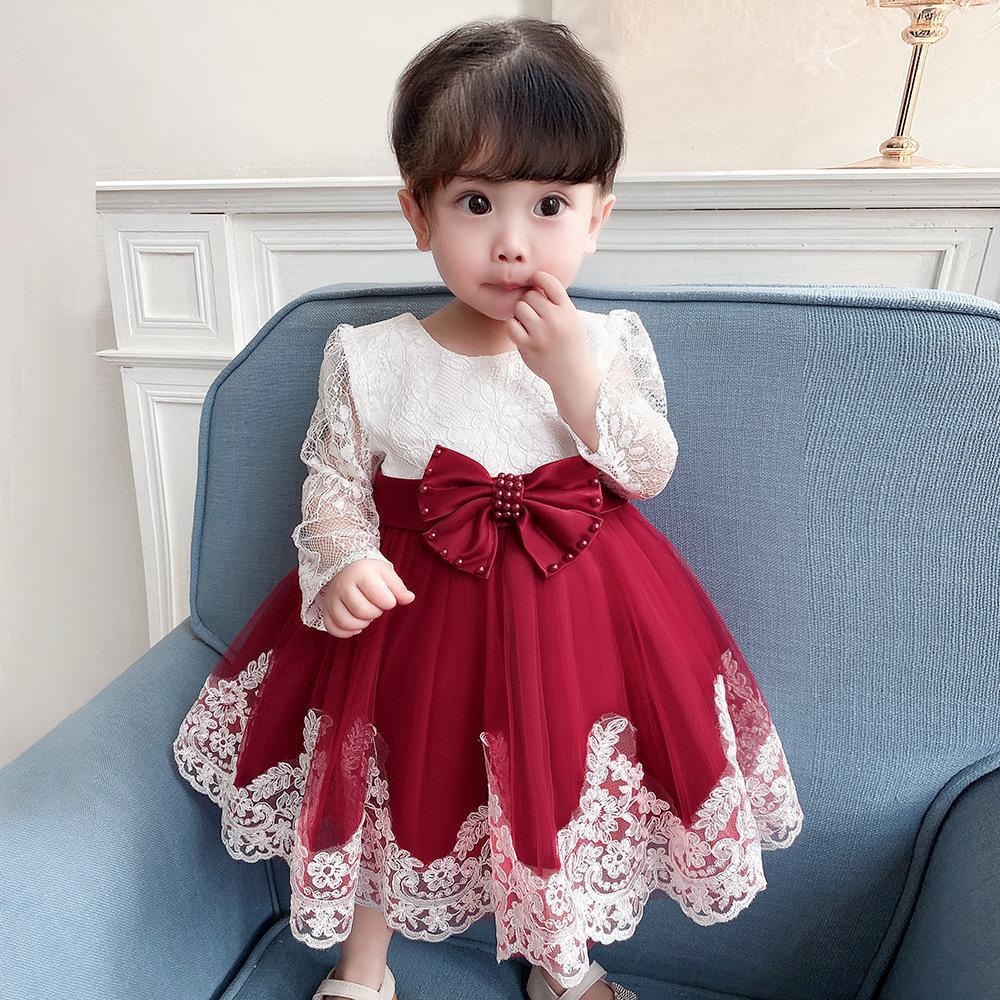 Picture of Amazon one-year-old dress long sleeve lace stitching wash dress bow beaded girl dress