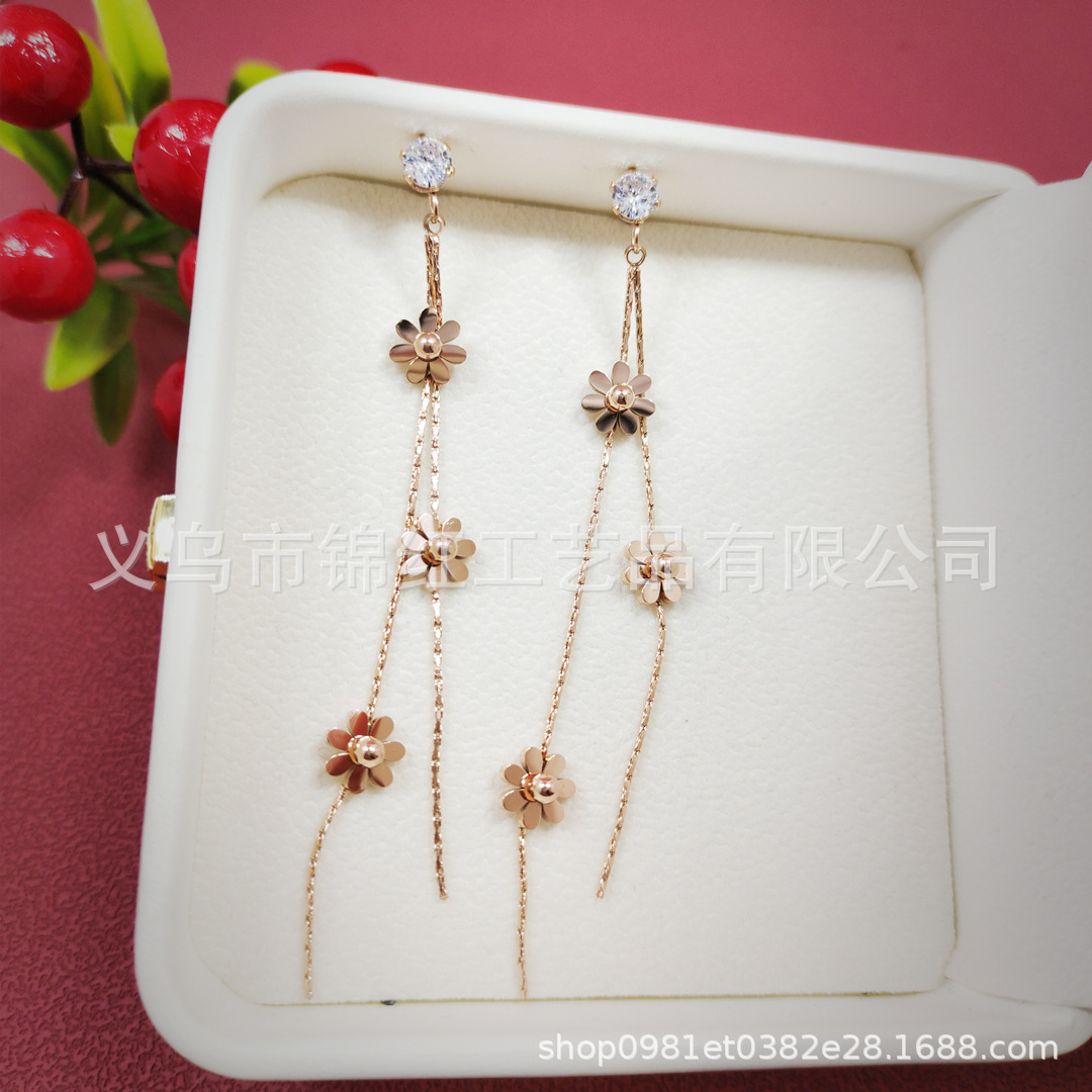 Japanese and Korean tassel flower earrings for women ins Super fairy high-grade titanium steel earrings long round face slimming earrings earrings