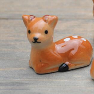 Picture of Ceramic crafts ornaments 12592 deer chopsticks rack sika deer chopsticks rack pen rack factory direct wholesale