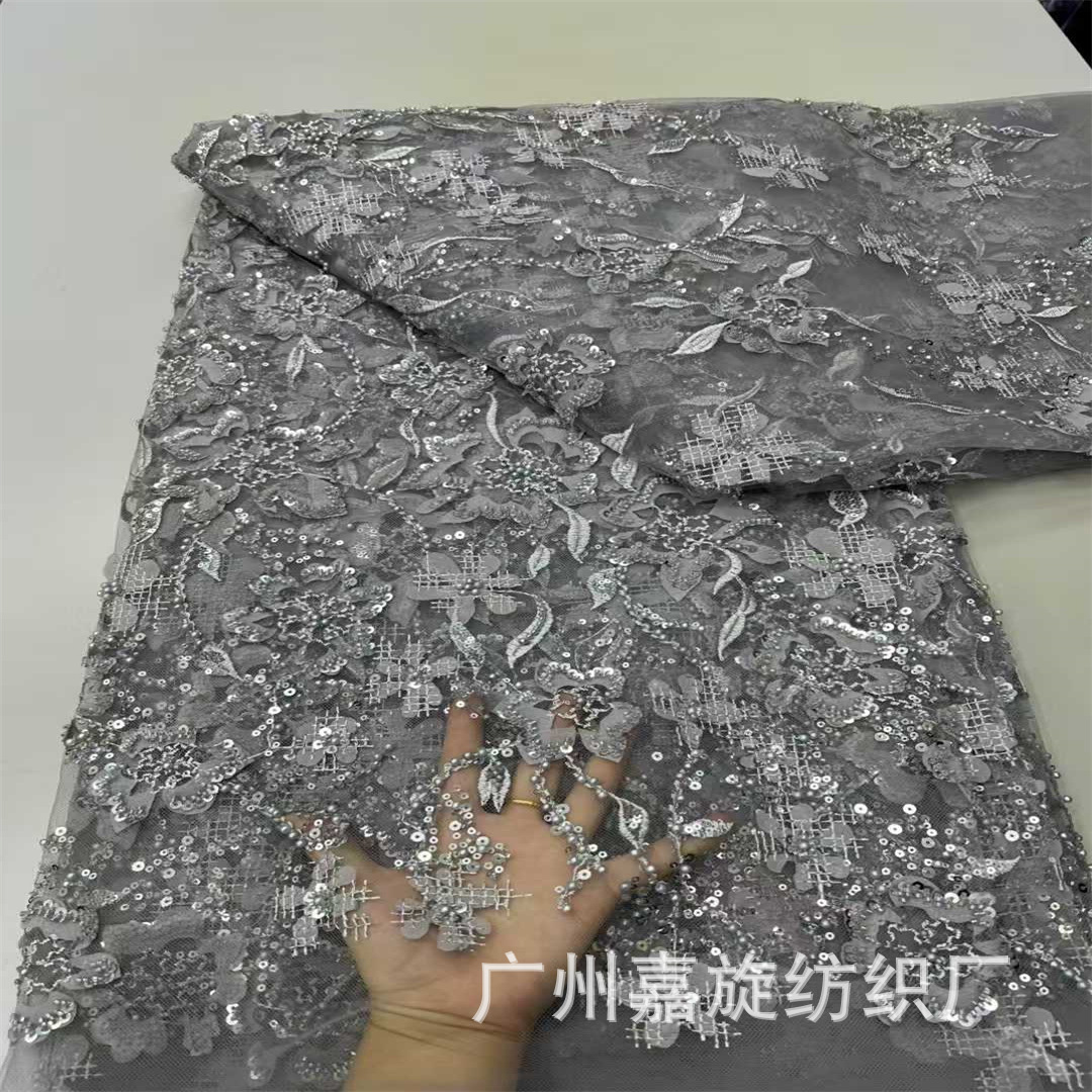 Picture of 2025 New Laser Floral Mesh Yarn Bead Tube Embroidery 3D Applique Pearl Sequin Embroidery Fashion Lace Fabric Beaded