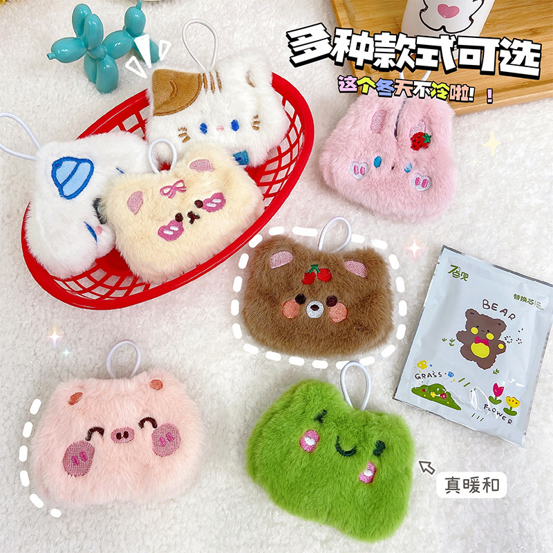 Picture of Cartoon plush hand warmer warm self-heating student compact portable warm egg warm baby hand warmer wholesale