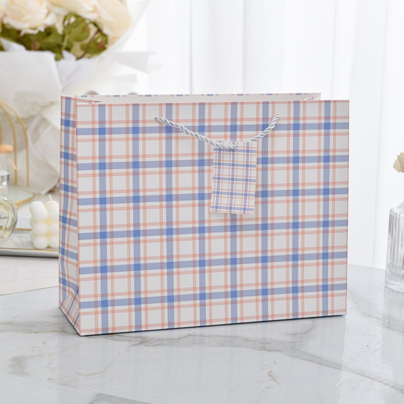 Picture of New horizontal plate thickened gift bag business fashion gift hand-held paper bag stationery jewelry store clothing packaging bag