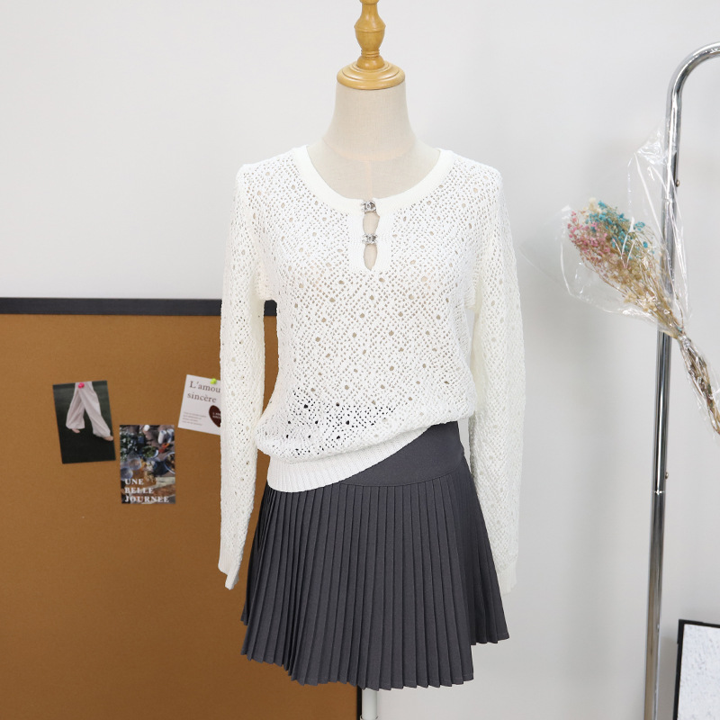 Nanyou haute couture small fragrance CH family 25 autumn new cut-out long-sleeved knitted sweater smock crew neck temperament solid color top