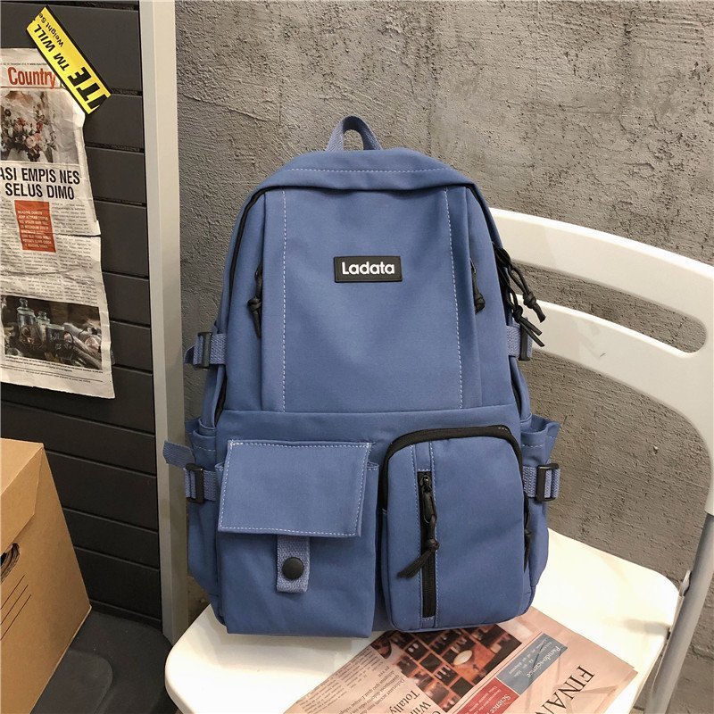 Picture of 2024 new Korean version of simple student schoolbag anti-theft anti-seismic college style backpack computer backpack wholesale LOGO