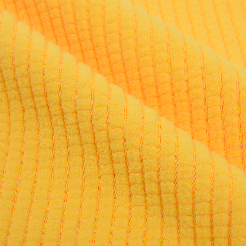 Picture of in stock pineapple plaid fleece sofa cover fabric wholesale waffle corn grain plaid jacquard flannel fabric