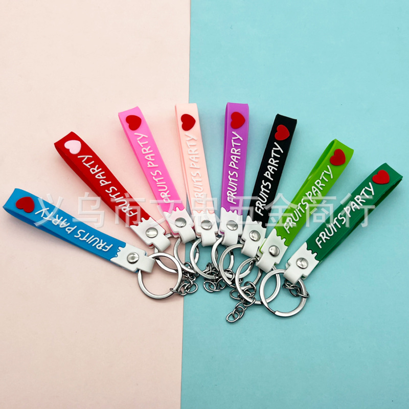 Cute fruit party English cartoon key chain pvc hand belt leather rope love doll pendant manufacturers wholesale