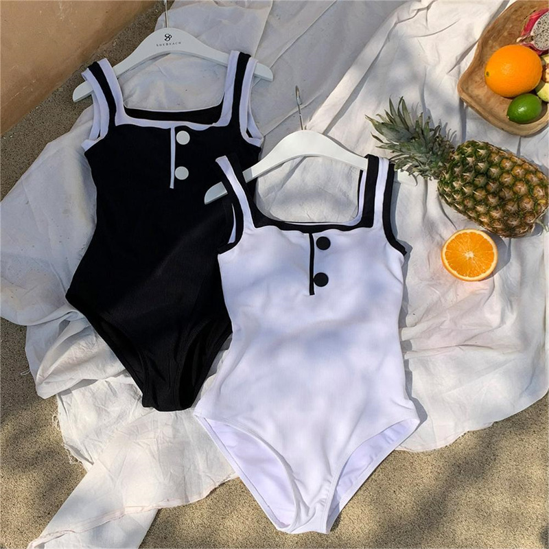 Source factory cross-border wholesale Korean version of simple black and white color matching slim students conservative one-piece hot spring swimming women