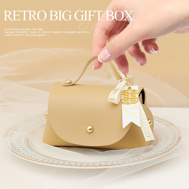 Picture of European Creative Wedding Candy Box Leather Ins Style Satchel Wedding Candy Bag Wedding Souvenir Gift Candy Gift Box