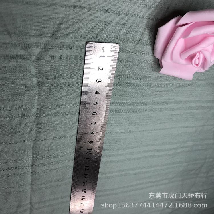 Spot supply of woven cotton sand wash Saro jacquard cotton thin 104 grams of empty Reed jacquard shirt clothing material