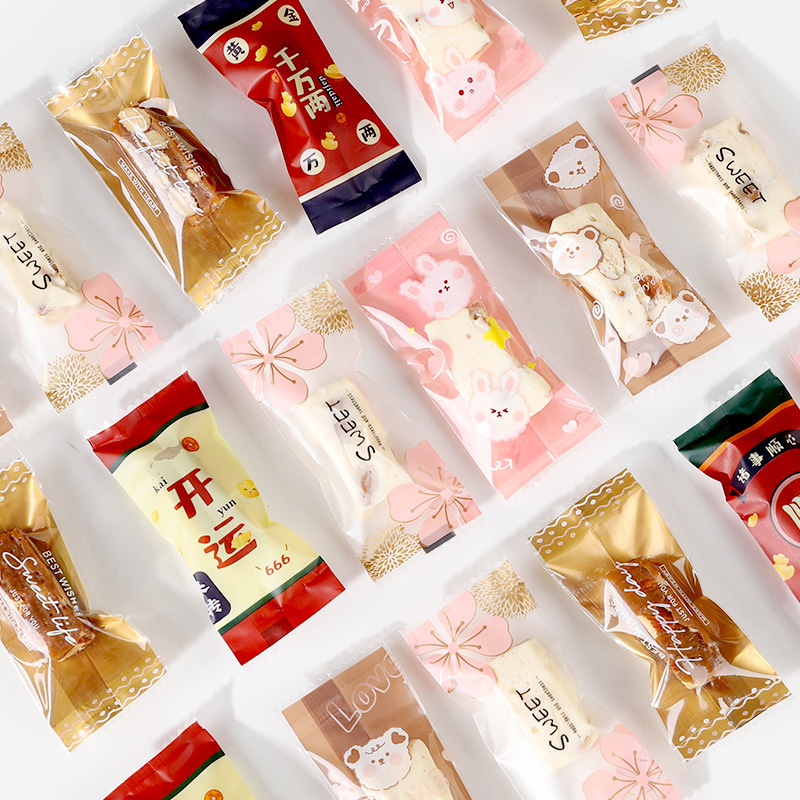 Toffee Nougat Snowflake Crisp Packaging Bag Transparent Machine Seal Sea Salt Milk Cake Crisp Candy Biscuits Wholesale