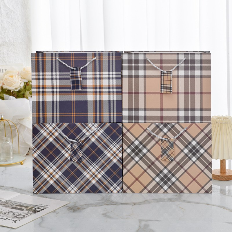 Picture of New horizontal plate thickened gift bag business fashion gift hand-held paper bag stationery jewelry store clothing packaging bag