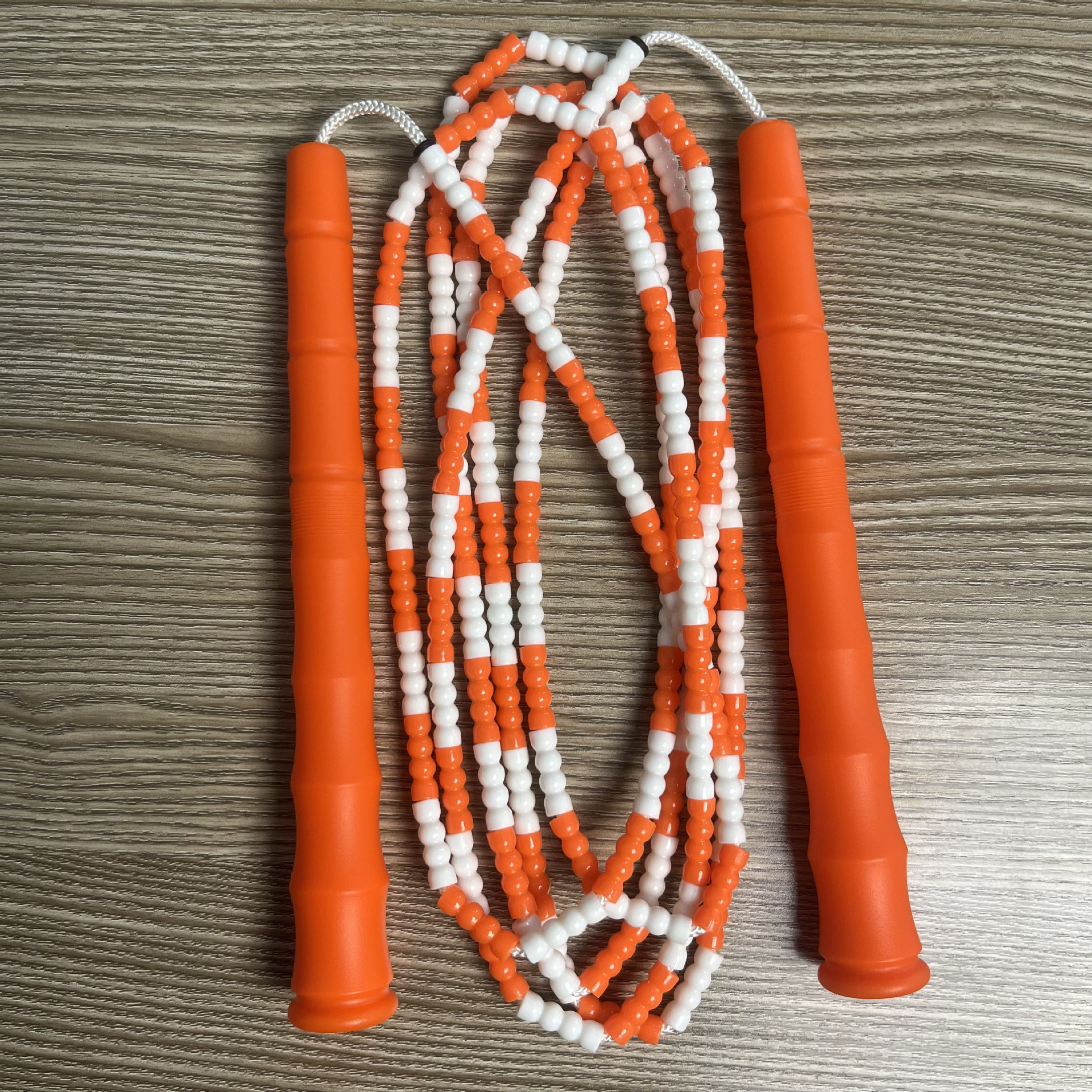 Picture of Manufacturer Wholesale Children's Fitness Sports Pattern Skipping Rope Kindergarten Competition Soft Bead Bamboo Skipping Rope for Primary School Students