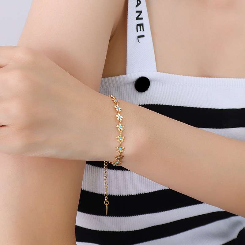Picture of Ins European and American Personalized Gold Flower Blue Oil Dripping Necklace Titanium Steel Plated 18K Real Gold Bracelet Set Non-Fading Jewelry