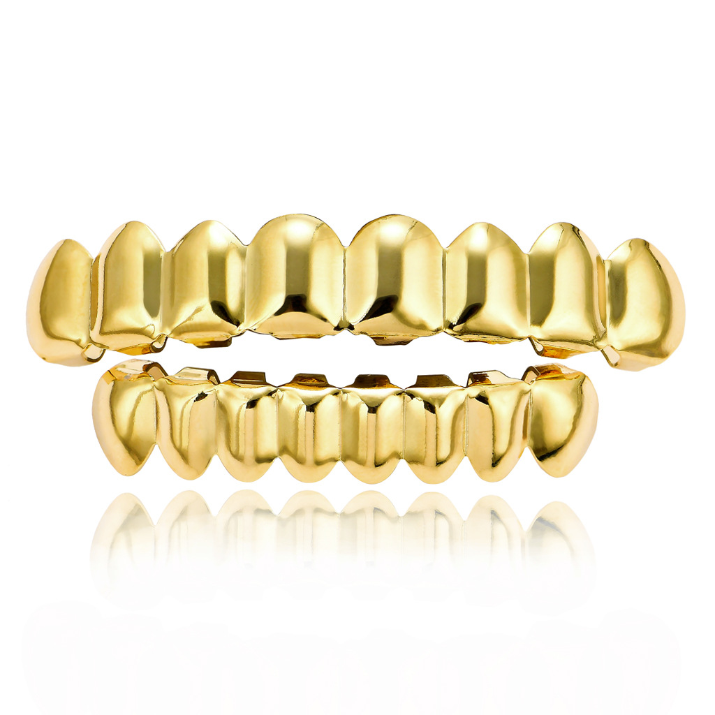 Picture of Europe and the United States HIPHOP hip-hop gold braces upper teeth 8 lower teeth 8 real gold plating 18K gold hip-hop braces wholesale