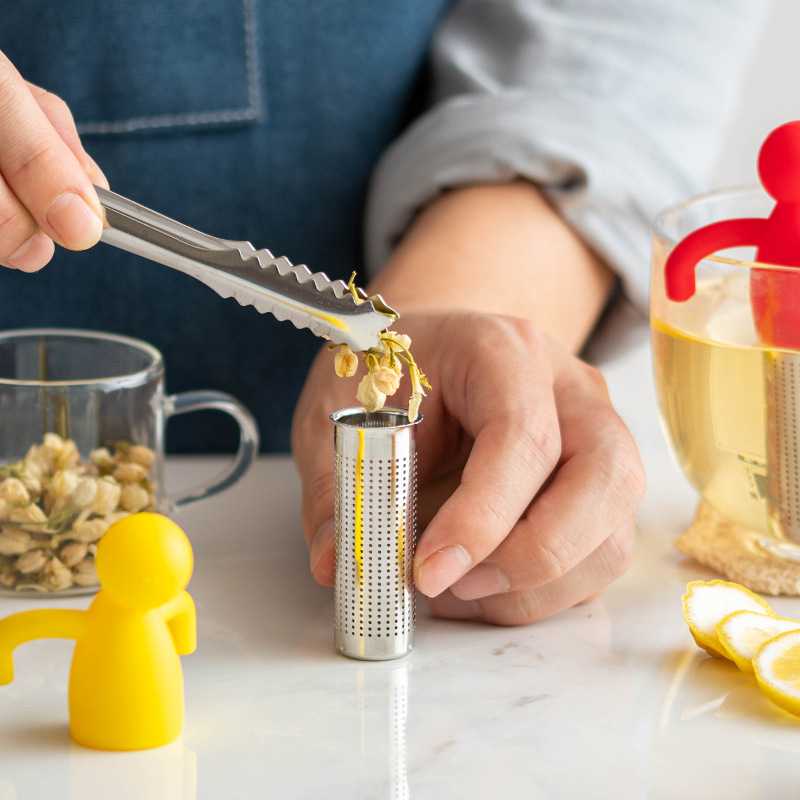 Picture of Creative 304 stainless steel silicone human-shaped tea strainer tea strainer hanging Cup-type tea residue tea bag strainer