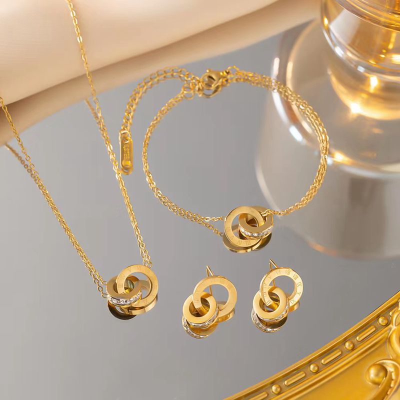Picture of Double ring Roman digital inlaid zircon jewelry suit fashion stainless steel bracelet bridal earrings Jewelry necklace three pieces