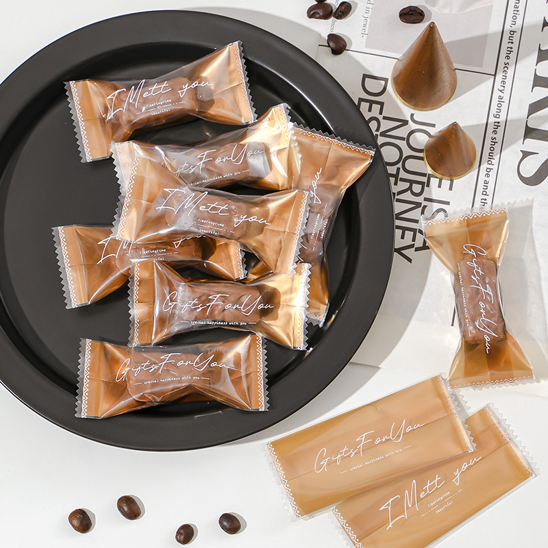 Net red toffee packaging bag nougat machine seal baking snowflake crisp candy bag candy paper candy bag factory wholesale
