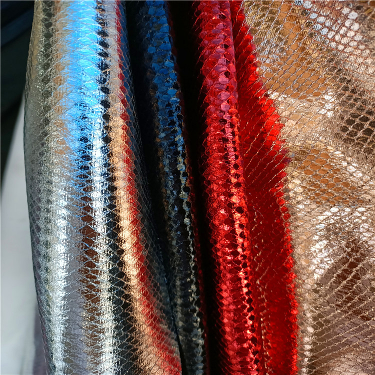 Guangzhou leather cork fabric textile fabric metal snake leather factory laser fabric shoe material leather