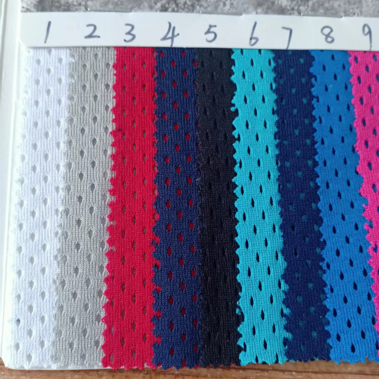 In-Stock 71-Color Warp Knit Fabric, Low-Stretch Mesh Fabric, Sports Clothing School Uniforms, Perforated Fabric, Mesh Fabric with Holes