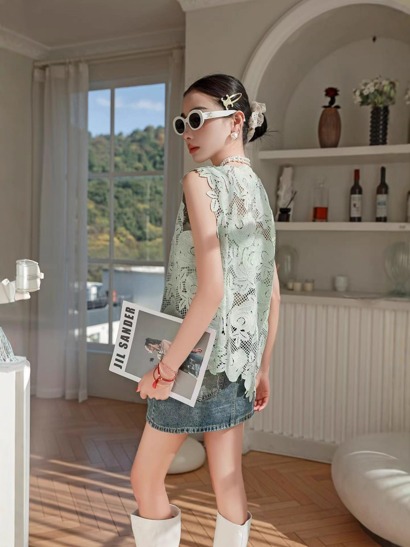 Picture of High-end European summer new unique hook flower hollow irregular hem sleeveless vest lace shirt girl