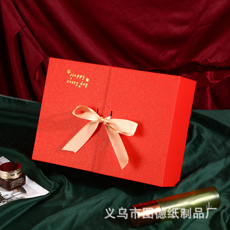 New red bow gift box spot on the door with hand gift box creative gift box Skin Care Packaging box