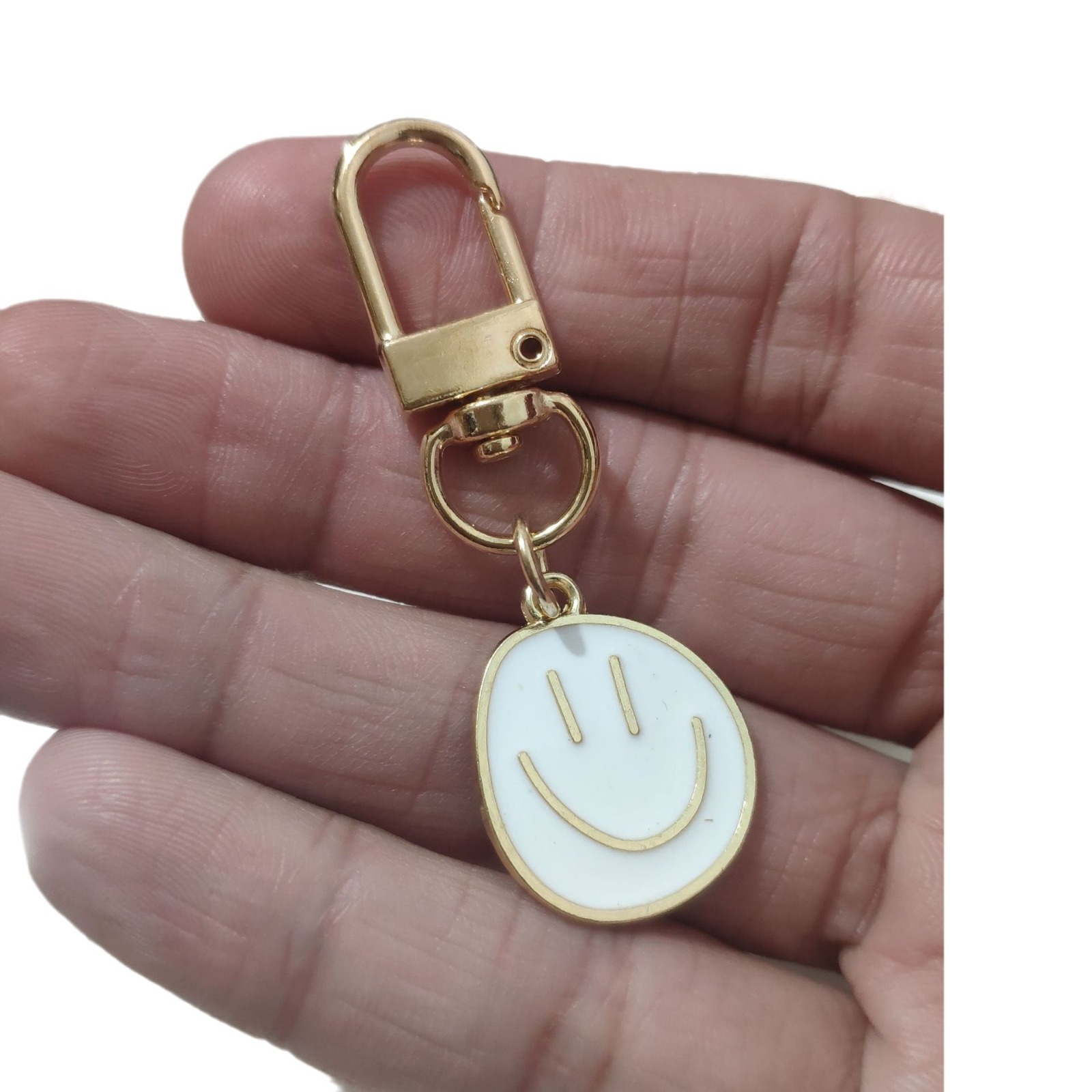 Picture of Cross-border e-commerce alloy color dripping smiley face keychain electroplated gold irregular expression bag pendant accessories