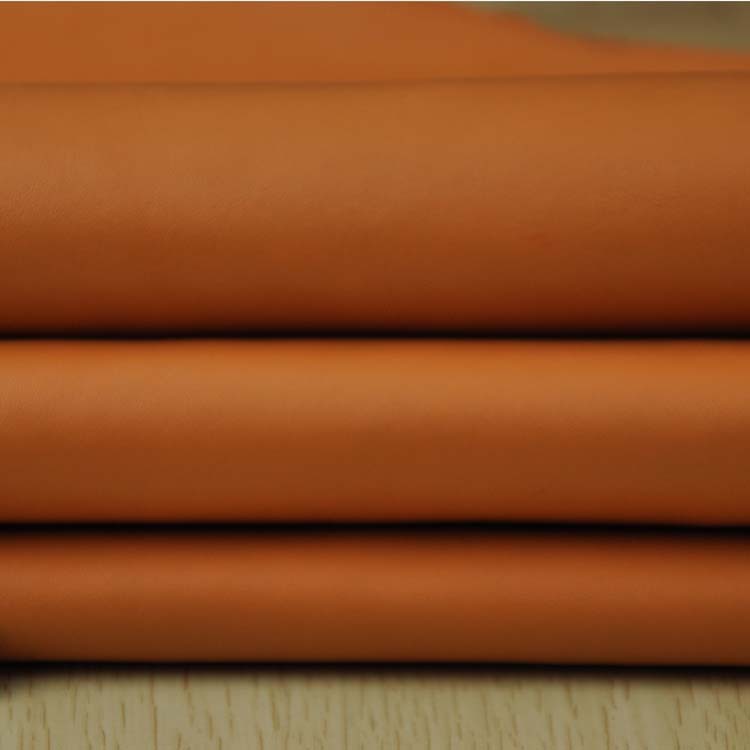 Picture of Two-layer Brown trademark cow leather wholesale pressure change trademark leather manufacturers color change trademark leather