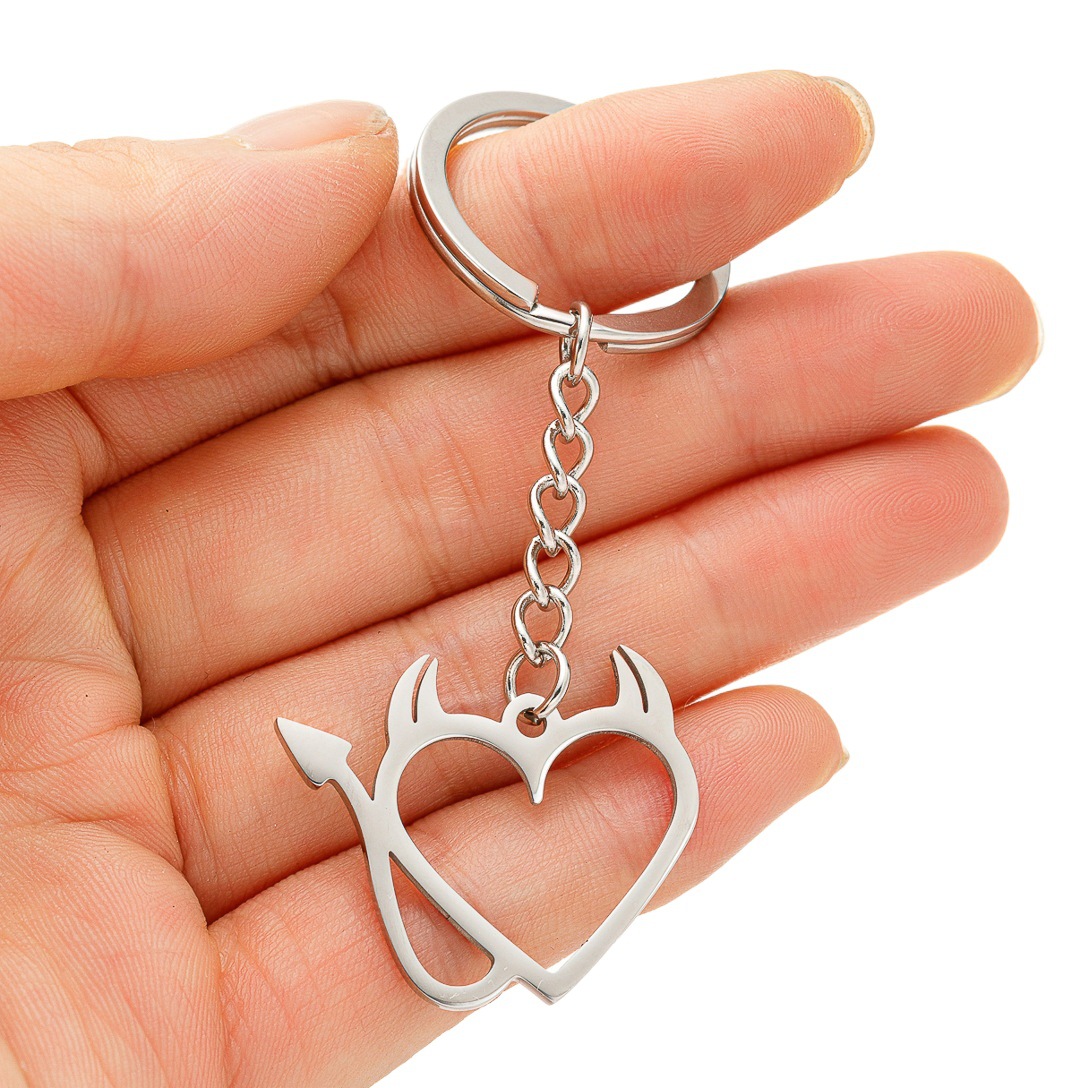 Japanese and Korean stainless steel metal keychain ins devil love bicycle stethoscope pendant schoolbag pendant in stock