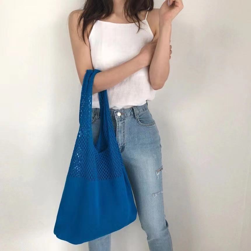Picture of Cute Knitted Bags 2024 Fashion Hollow Handbags Fashionable and Easiest for Match Shoulder Bags Large Capacity Tote Bags Cross-Border