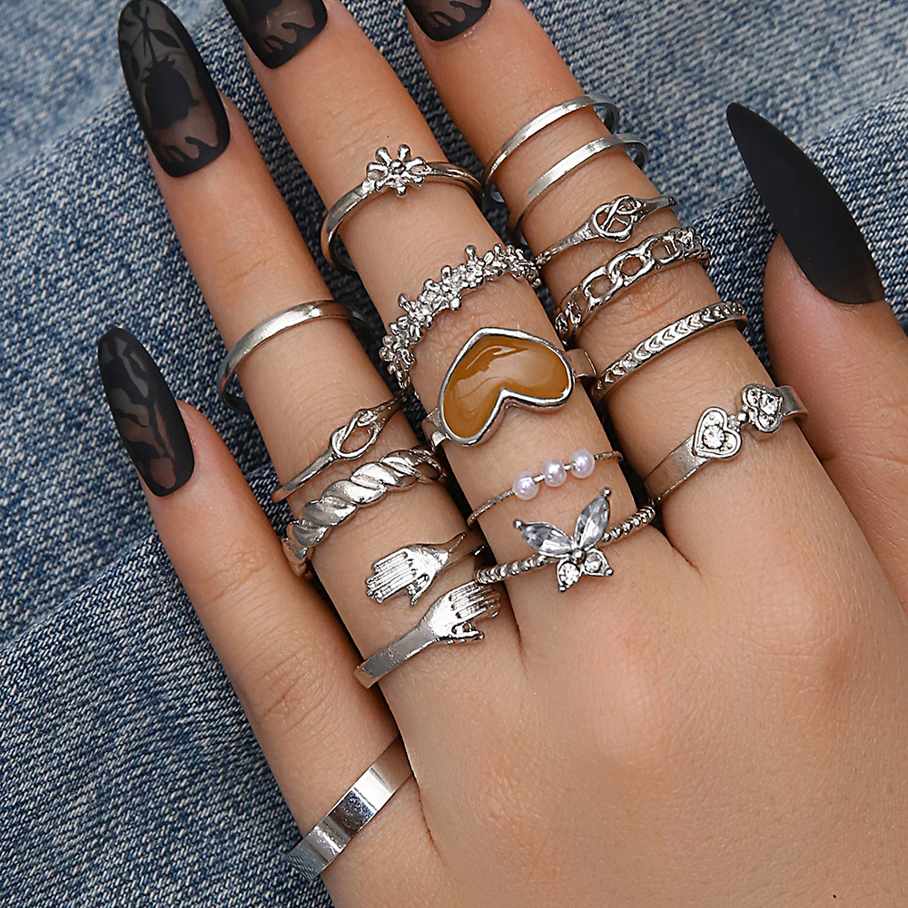 Cross-border hot-selling ring fashion love drop oil twist personality butterfly micro diamond palm combination 15-piece set