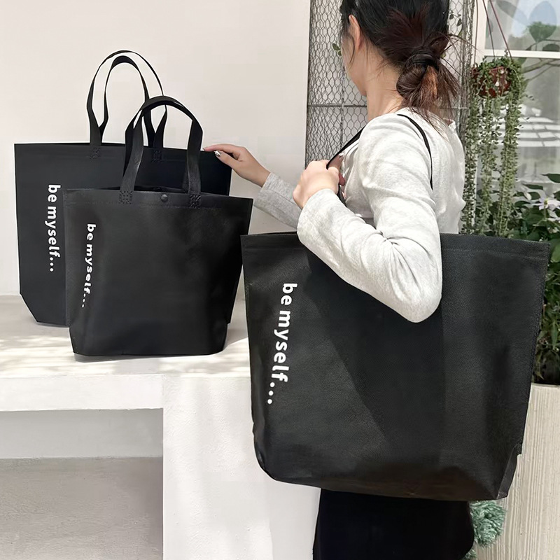 Internet celebrity clothing store women's hidden buckle non-woven handbag environmental shopping clothes hand bag printed LOGO