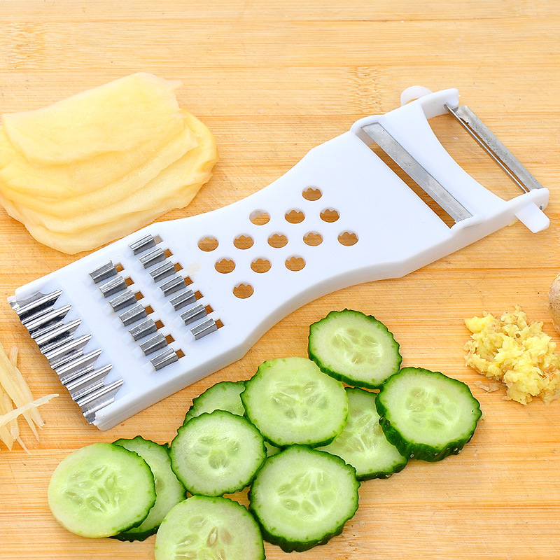 Plastic peeler vegetable cutter grater shredded peeler seven-function vegetable cutter Taobao gift