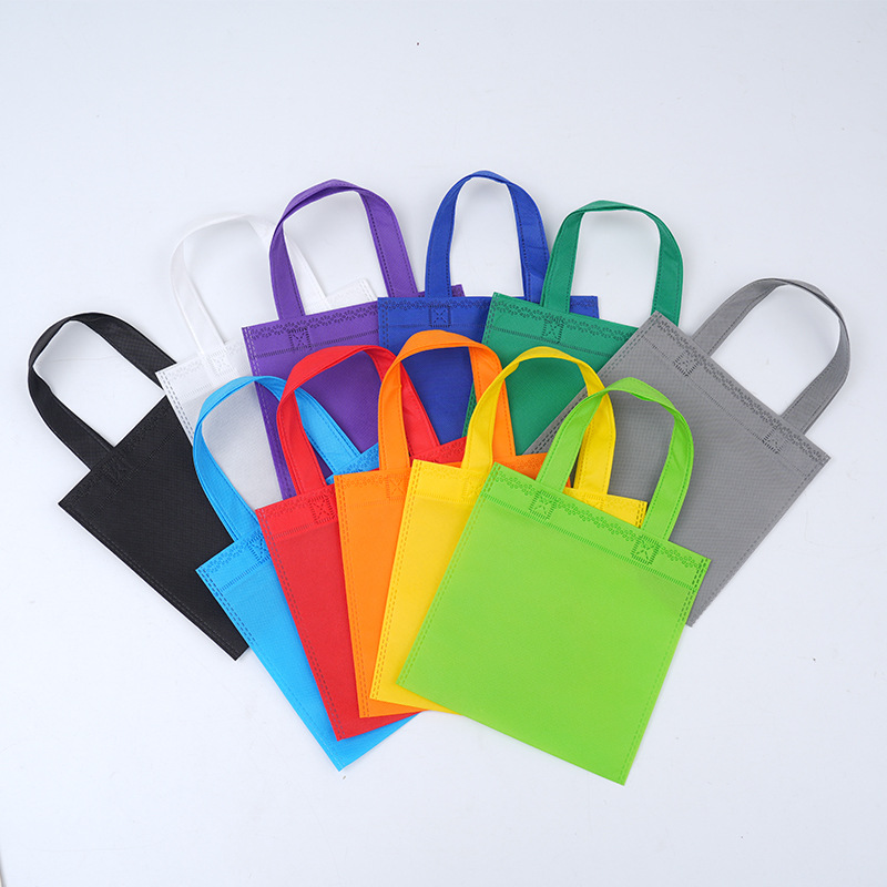 Foreign trade cross-border candy non-woven bag solid color non-woven handbag custom logo shopping gift packaging bag