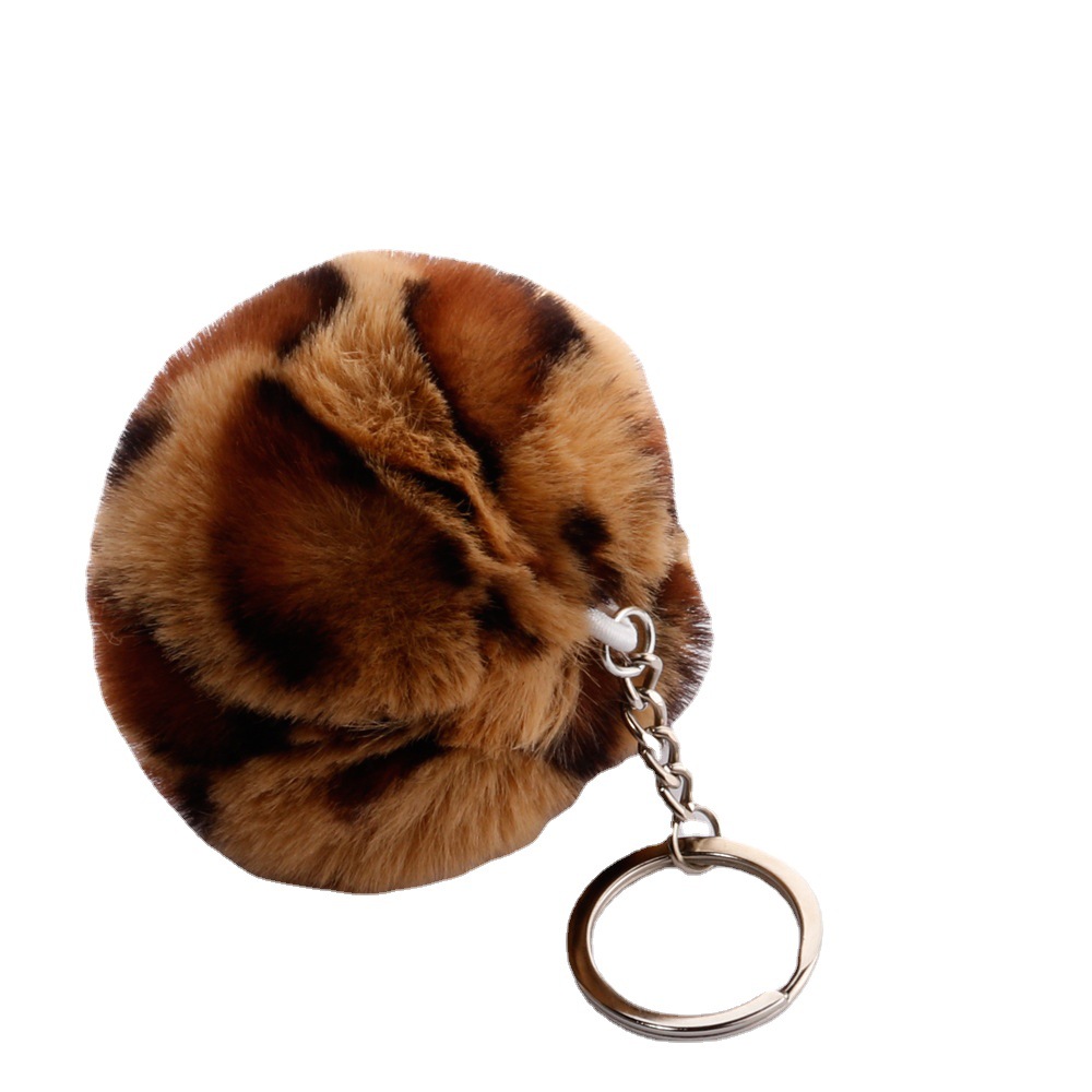 Cross-border e-commerce leopard print fur ball key chain European and American fashion trend imitation Rex rabbit fur ball pendant luggage hanging accessories gifts