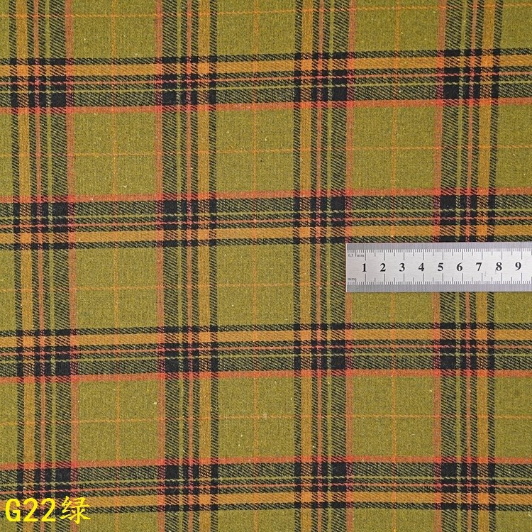 Picture of 140g Yarn-Dyed Plaid Woolen Fabric in Stock Wholesale 21S Yarn-Dyed Twill Brushed Plaid Shirt Fabric Ins Flannel