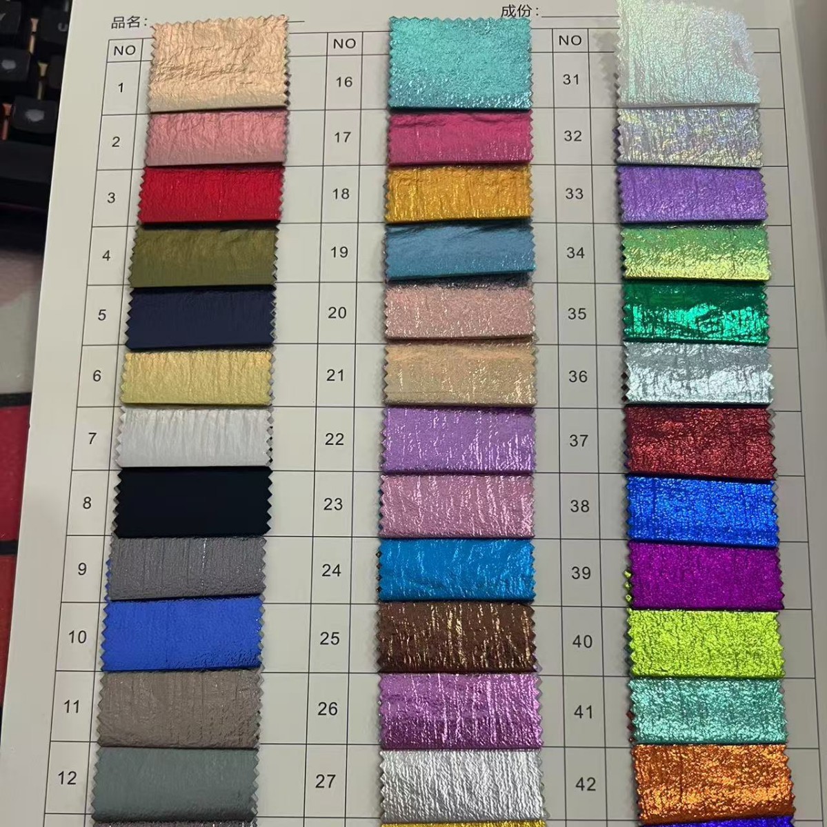 Picture of Metal wrinkle 380T wrinkle nylon spinning elastic cloth bronzing hot silver fabric bright down jacket cotton-padded jacket fabric