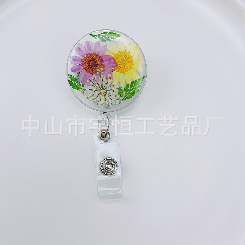 Picture of 2022 Cross-border Dried Flower Easy Pull Button Real Flower Transparent 360-degree Easy Pull Doctor Nurse Scroll Badge