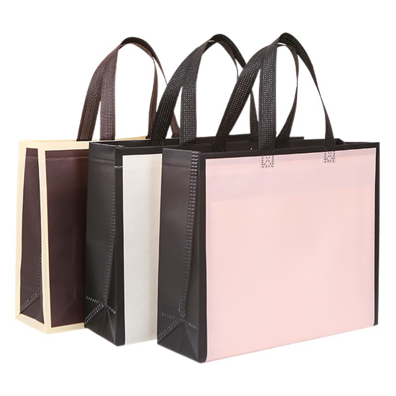 Non-woven handbag clothing store printing film pink new clothes bag gift packaging bag in stock wholesale